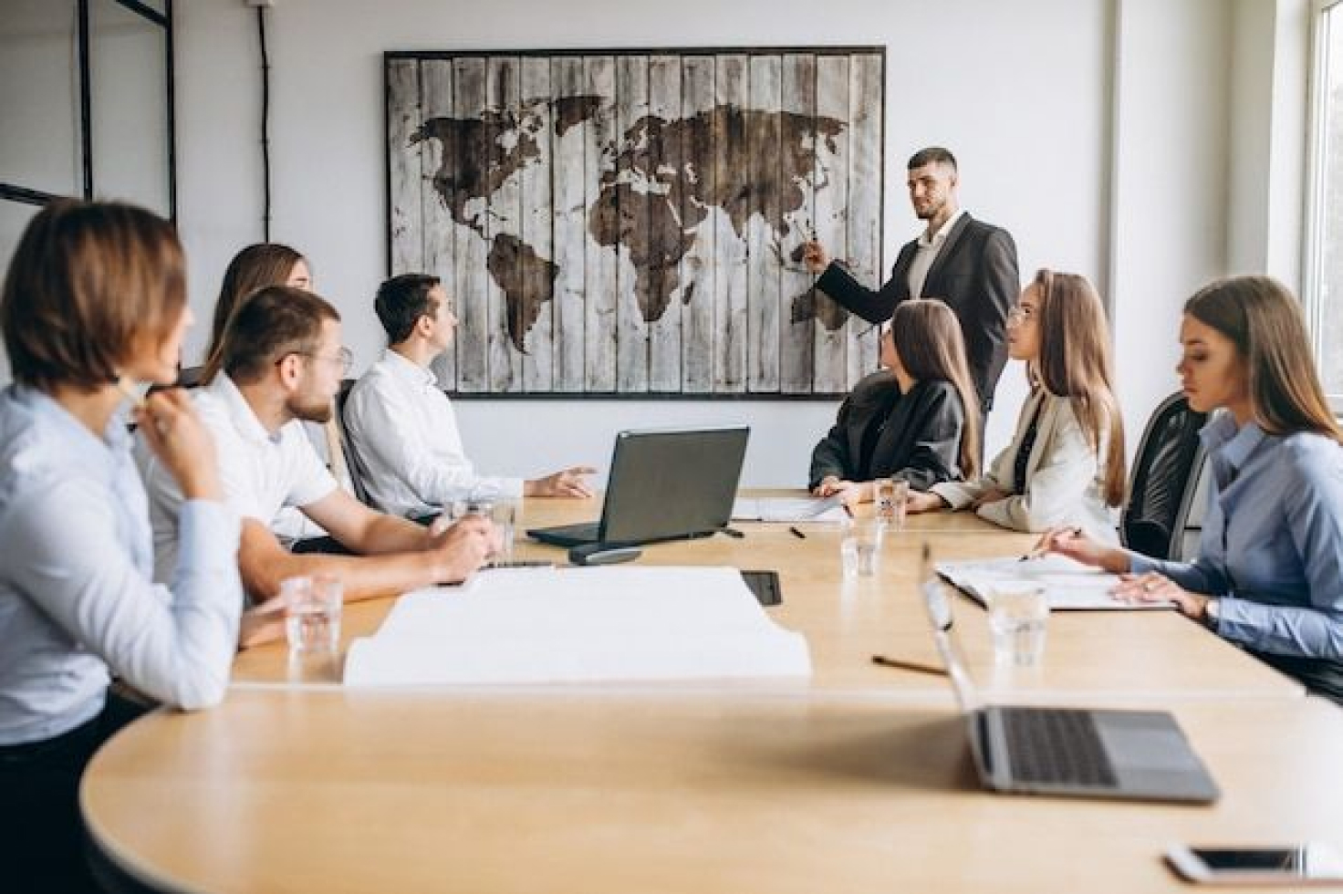 Free Photo _ Group of people working out business plan in an office